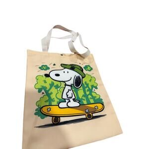 Snoopy canvas tote bag Snoopy on a skateboard with green trees